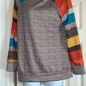 WOMANS BROWN SHIRT WITH MULTI COLOR STRIPED SLEEVES